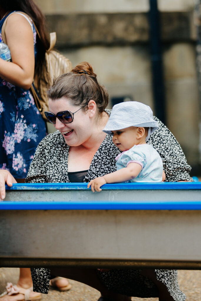 A Mum and baby enjoying the Splash Zone.